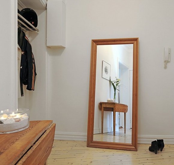 decorating hallway with floor hugging mirror