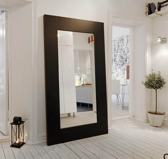 decorating hallway with floor hugging mirror