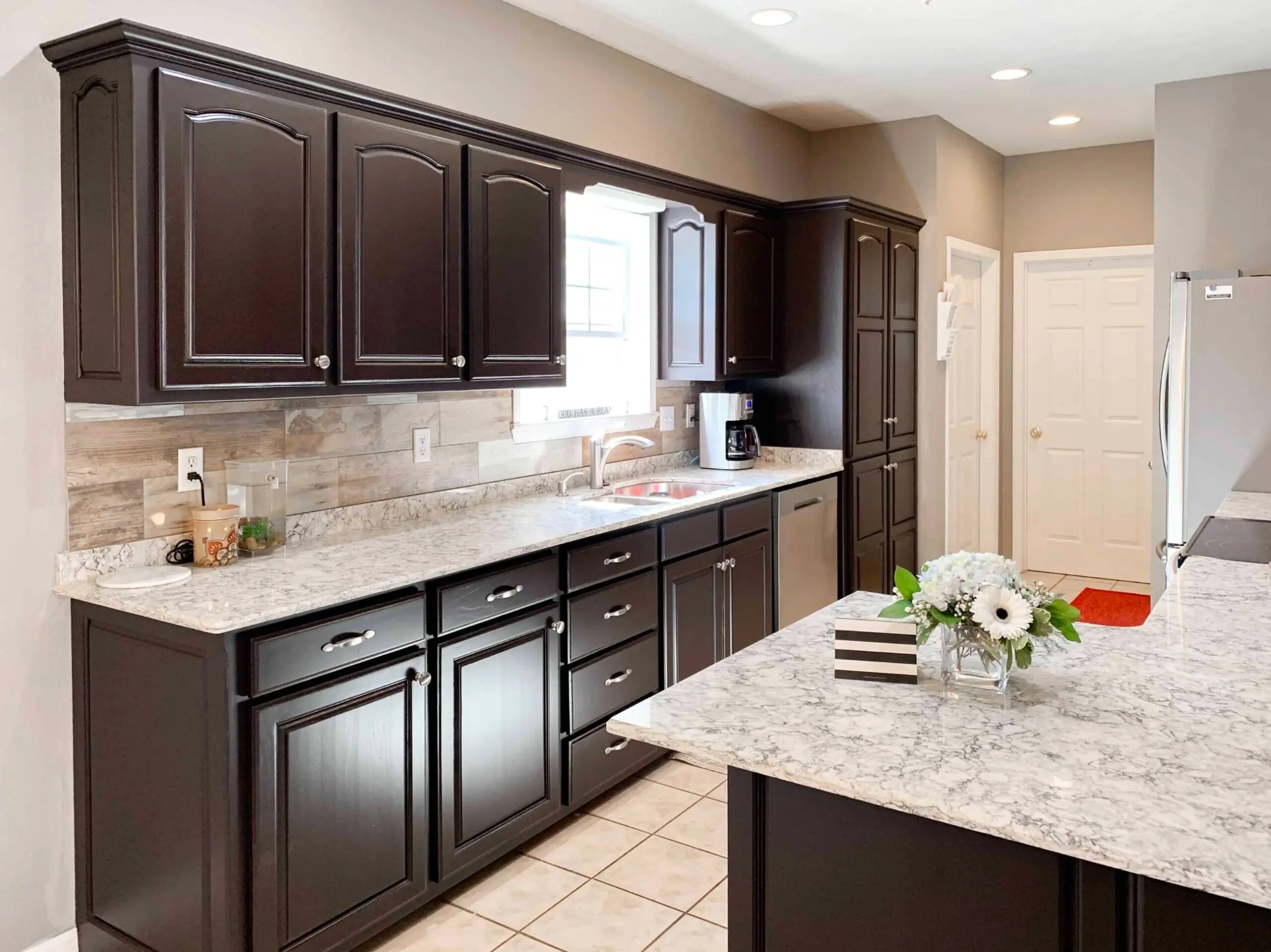 Brown Kitchen Cabinets with light counter top