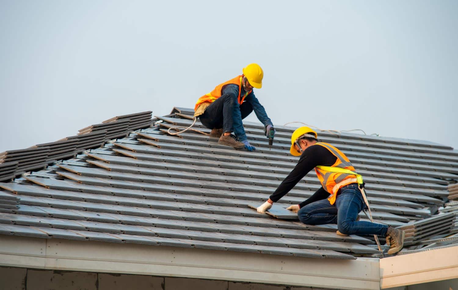 Workers Replacing Roof